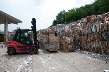 forklift, recycled paper bales